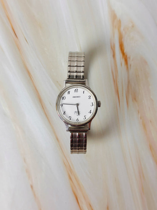 Seiko Clock Quartz Women’s Watch – Minimalist White Dial – Stainless Steel Bracelet