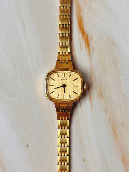 Vintage Timex Women’s Watch – Manual Wind – Gold Tone Square Case – Champagne Dial