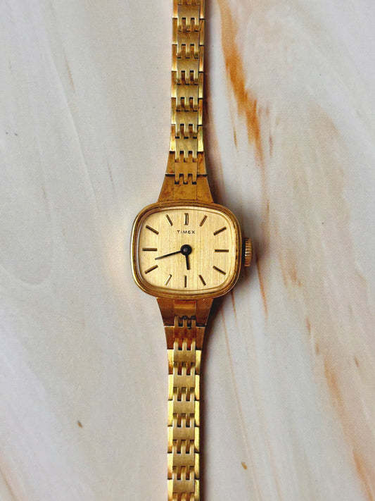 Vintage Timex Women’s Watch – Manual Wind – Gold Tone Square Case – Champagne Dial