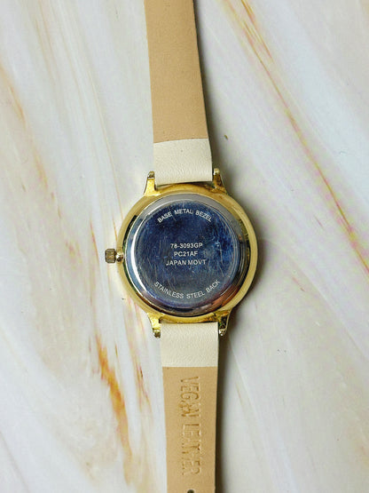 Ladies Floral Dial Quartz Watch – Gold Tone Case – White Strap