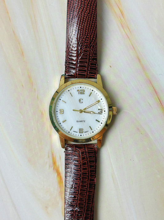 Charming Charlie Ladies Quartz Watch – Gold Tone Case – White Dial – Brown Textured Strap