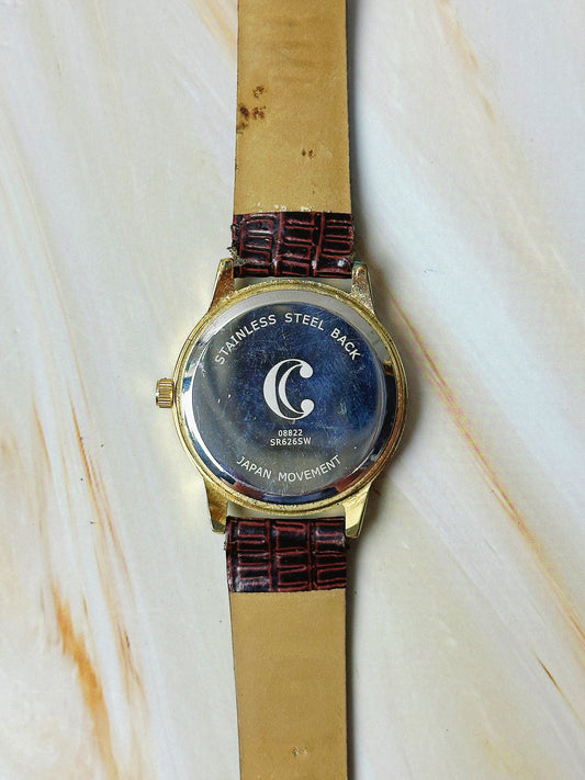 Charming Charlie Ladies Quartz Watch – Gold Tone Case – White Dial – Brown Textured Strap