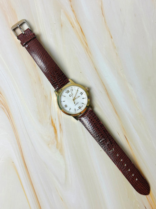 Charming Charlie Ladies Quartz Watch – Gold Tone Case – White Dial – Brown Textured Strap
