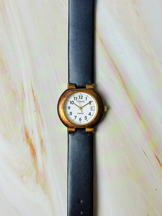 Carriage Indiglo Ladies Watch – Date Display – Classic White Dial – Black Leather Strap