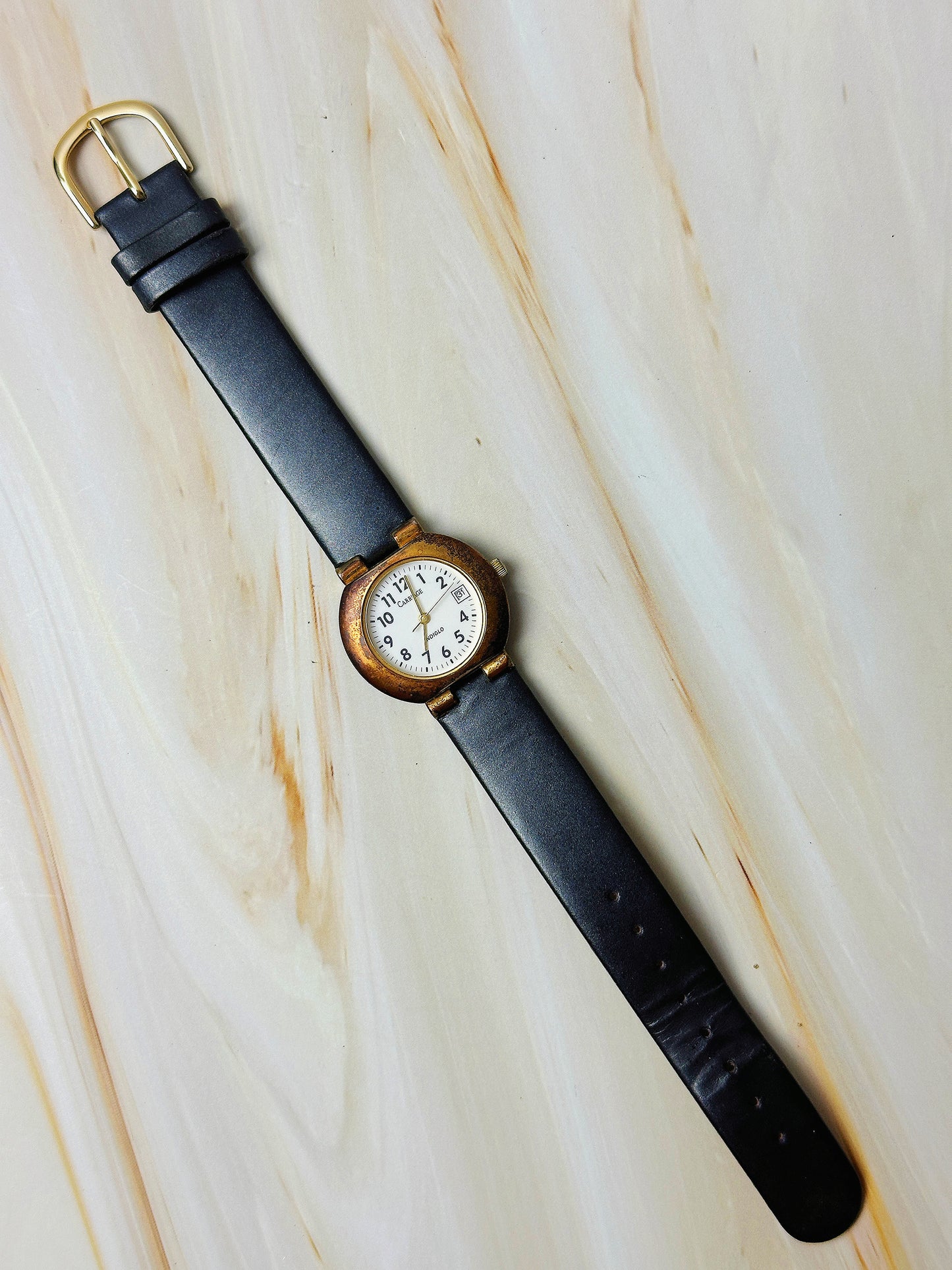 Carriage Indiglo Ladies Watch – Date Display – Classic White Dial – Black Leather Strap