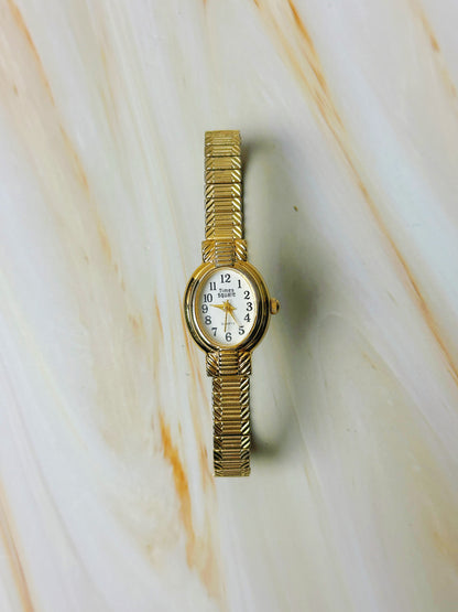 Times Square Ladies Watch – Gold Tone – Stretch Bracelet – Classic White Dial