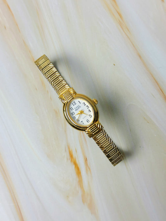 Times Square Ladies Watch – Gold Tone – Stretch Bracelet – Classic White Dial
