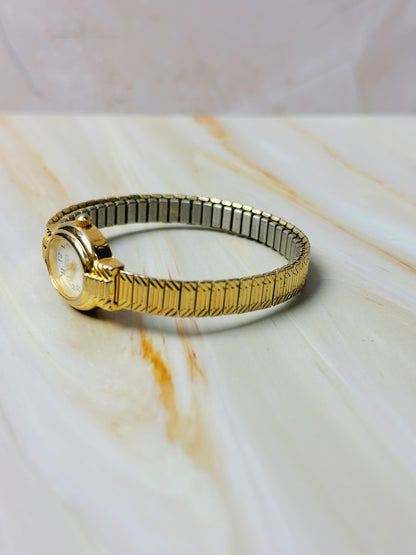 Times Square Ladies Watch – Gold Tone – Stretch Bracelet – Classic White Dial