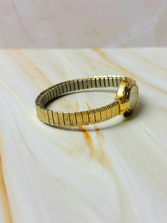 Times Square Ladies Watch – Gold Tone – Stretch Bracelet – Classic White Dial